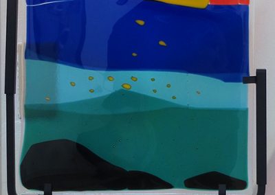 Ellen Rebarber – “Moon over the Mountain” fused glass with various colors