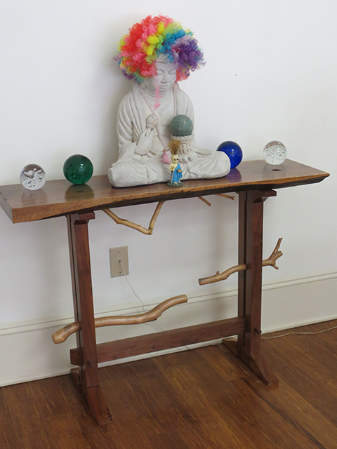 John Marron  – “Rainbow Buddha Wigging Out” installation with black walnut altar table by Phil George