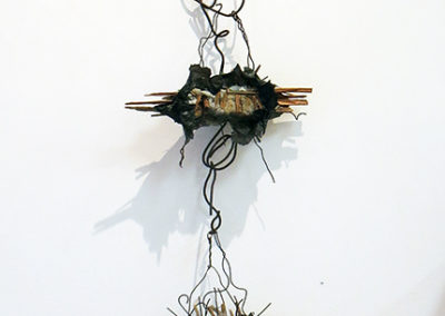 “Hanging Abstract”  mortar, wire paper and found objects, – by Eric Beckerich