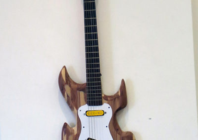 Brian McCormack “Arts and Crafts Guitar” handcrafted from discarded cedar chest & found objects