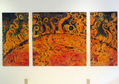 Brian McCormack   “The Sun Swallowing The Earth and Moon”  scorched wood and paint