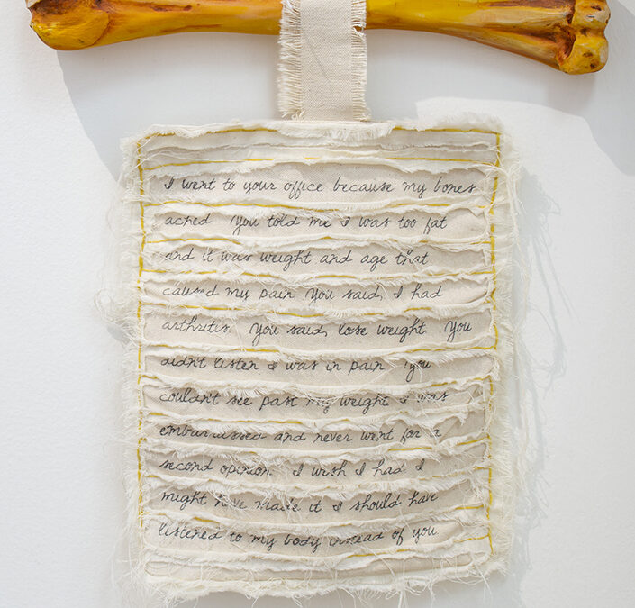 Eryn Lewis “The Doctor’s Note” wall mounted sculpture, canvas, wood, paint, silk ribbon, $500.00