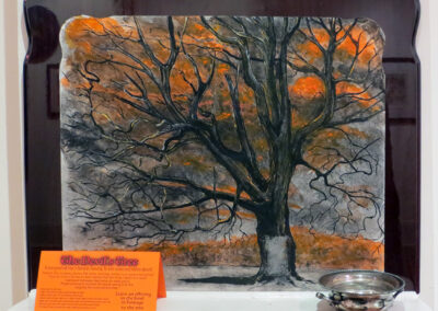 Brian McCormack “The Devil’s Tree” charcoal from the tree, ink, day glow paint on found table top, $450.00
