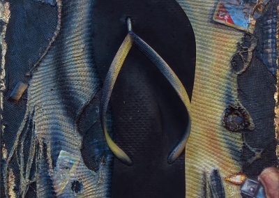 “Flip Flop of Antiquity” – 11″ W x 16″ H – Collage and oil on panel with found flip flop, thermal underwear fabric, Marlboro cigarette pack, cigarette butts, coupon, bottle caps, gold leaf
