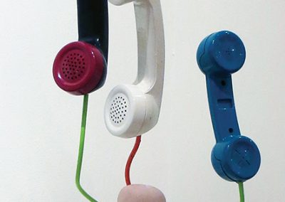 Fred Cole -“Healthy Confusion”recycled phones, toy phone and components, porcelain doll head