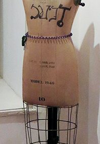 Fred Cole    – “Jeannie” dress maker’s mannequin, electric cord light, street lamp lens
