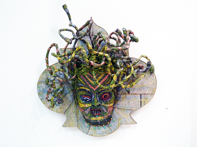 Wall Street Medusa – relief sculpture on panel with paper mache’, wire, Wall Street Journal, gauze and oil paint, snake skin and plastic jewels – 22″ x 19″ x 6″ SOLD