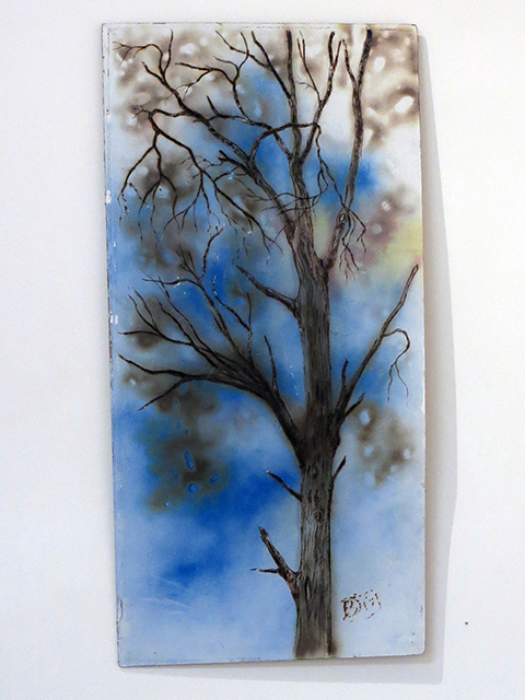 Brian McCormack   “Scorched Tree on Blue” torch, pyro detailer, paint on scrap wood fro Ikea furniture