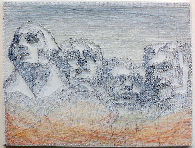 Poramit Thantapalit  “Headline” string art made of sewing thread wrapped through nails on board,  $500.00