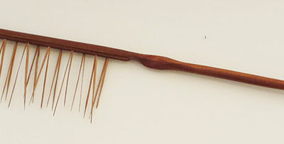 E. Carol O’Neill –  “Rat Tailed Comb in Pine” carved wooden sculpture, NFS