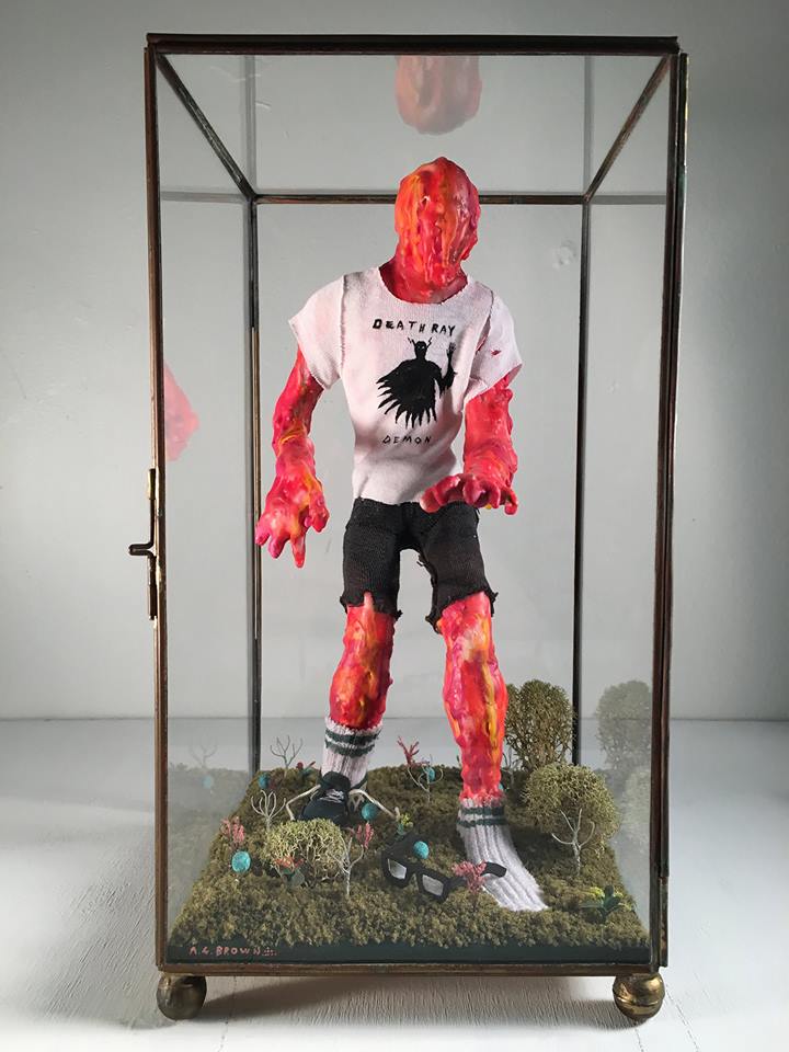 Alan Brown “The Return of Bobby Trentino” – Paper clay, wax, crayon, fabric, wood, cardboard, moss, diorama miniatures, acrylic