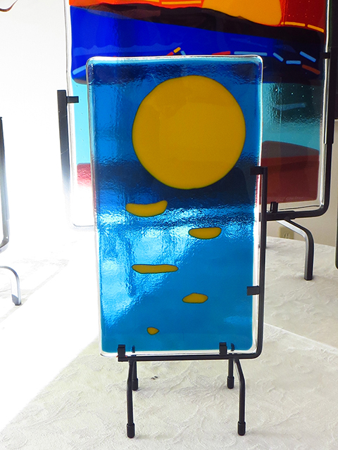 Ellen Rebarber   “Moon Over Maine” Fused glass with yellow on transparent blue