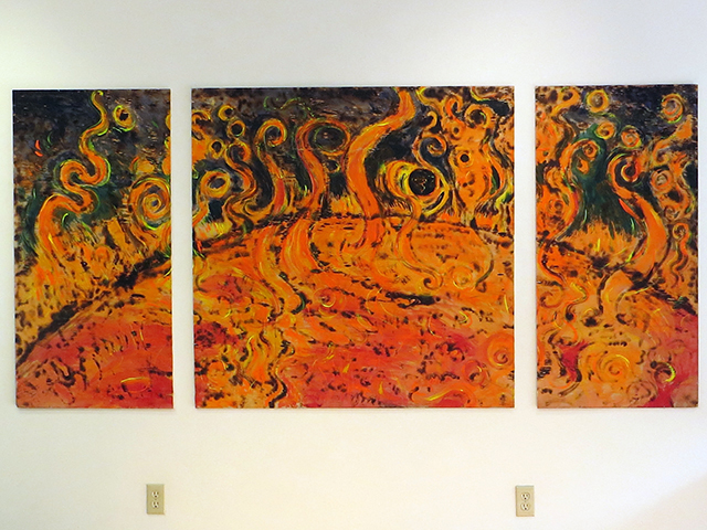 Brian McCormack   “The Sun Swallowing The Earth and Moon”  scorched wood and paint