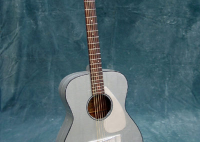 Duct Tape Guitar – found guitar busted open in the back, repaired adduct taped and silver paint on neck