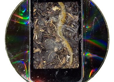 Brian McCormack   “Worm Food”, found object (iPod touch), dirt, epoxy, moldable epoxy, 8” x 8” x 2”, 2023, NFS