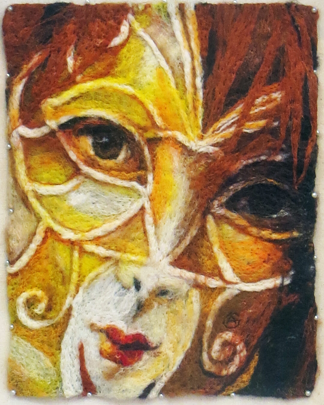 Agnes Golen “Masked Self Portrait” wet and needle felted wool, 14” w x17”H, – $675.00